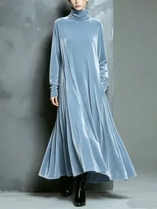 Elegant light blue velvet turtleneck maxi dress with long sleeves and pleated flared skirt