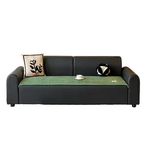 Green corduroy sofa cushion mat featuring an anti-slip quilted pattern for furniture protection