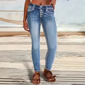 Women's stylish slim fit blue elastic denim jeans with contrast white stitching and button fly