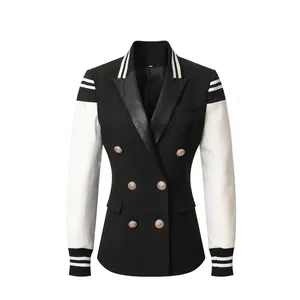 Elegant black and white double-breasted blazer with striped cuffs and gold buttons