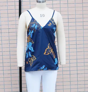 Casual navy blue V-neck camisole with blue butterfly print as seen on a mannequin