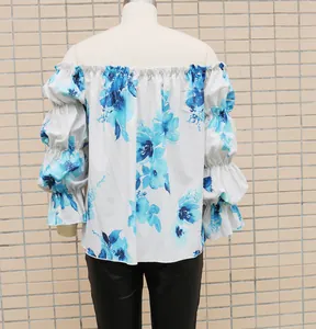 Vue arrière détaillée d'une blouse à épaules dénudées avec imprimé floral et manches bouffantes