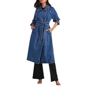 Long blue denim trench coat for women with belted waist and double pockets