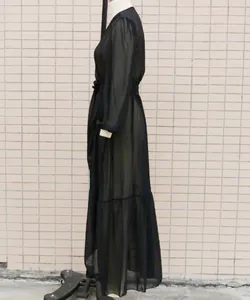Black sheer chiffon long-sleeved maxi dress cover-up displayed on a white mannequin