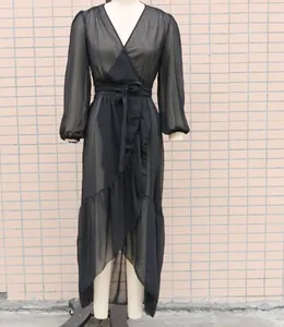 Front full length view of black sheer chiffon wrap beach cover-up maxi dress with ruffles