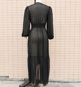 Detailed back view of a black long-sleeve sheer chiffon beach cover-up maxi dress