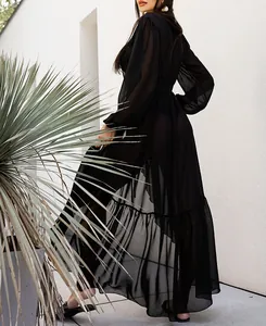 Elegant sheer black chiffon beach cover-up maxi dress with long sleeves and ruffled hem