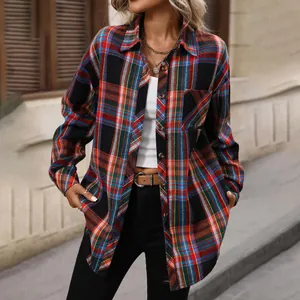 Close-up of women's vintage plaid shirt with vibrant red and blue check pattern.