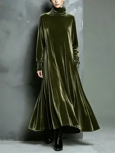 Elegant olive green velvet maxi dress with a turtleneck design and a flared hem detail