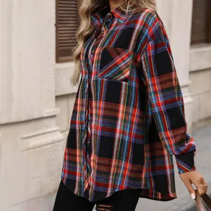 Close-up detail of a women's vintage colorful plaid long-sleeve button-down shirt