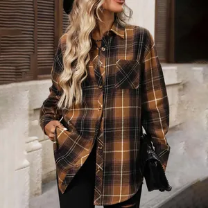 Detailed view of a vintage plaid long-sleeve shirt for women in classic autumn brown colors