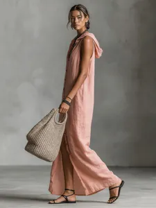 Close-up detail of a pink sleeveless hooded maxi dress featuring button-down front