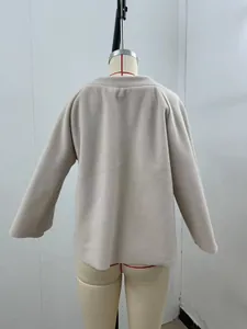 Detailed back view of a cozy loose-fitting beige fleece jacket for autumn and winter