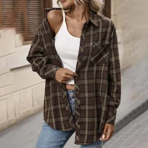 Close-up of a women's vintage brown plaid long sleeve shirt worn as an outer layer