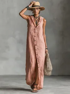Full-length photo of a sleeveless pink hooded button-down maxi dress with summer props.
