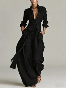 Elegante zwart shirt met lange mouwen en revers gecombineerd met wijde broekset set
