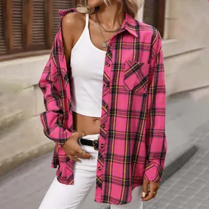 Detail of women's vintage pink plaid long-sleeve shirt styled with white tank top