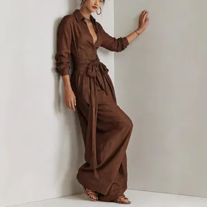 Elegante bruine jumpsuit met lange mouwen, reverskraag en tailleband voor de lente