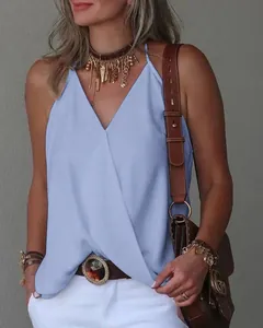 Close-up of a women's light blue V-neck sleeveless top with a loose, wrap-style front design.