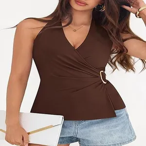 Detailed view of women's brown halter V-neck top featuring a stylish gold ring waist detail