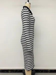 Side profile view of a black and white striped long-sleeve bodycon dress on mannequin
