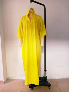 Full view of a bright yellow V-neck mid-sleeve loose maxi dress on a studio mannequin