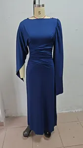 Elegant navy blue long sleeve slim fit evening gown detail on a dress mannequin