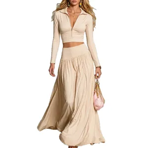 Κομψό μπεζ σετ δύο τεμαχίων με μακρυμάνικο crop top και μακριά φούστα για γυναίκες