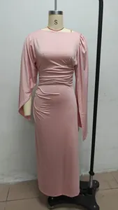 Elegant pink floor-length evening dress with ruched waist and long cape sleeves detail