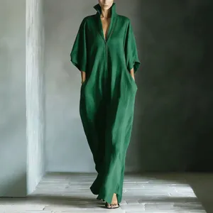 Elegant green V-neck long dress with a loose fit and midi sleeves for stylish women