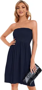 Fashionable navy blue strapless smocked dress with a textured bodice for summer events.