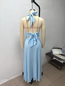 Detail of light blue halter maxi dress with backless tie design on a mannequin