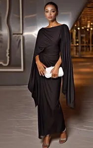 Elegant black evening gown featuring pleated waist and unique cape sleeves detail