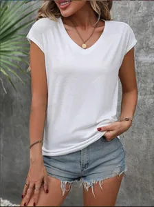 Close-up view showing the soft fabric texture and relaxed V-neck detail of the white tee