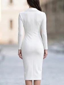 Rear view of elegant white long-sleeved midi dress with suit lapel collar for business