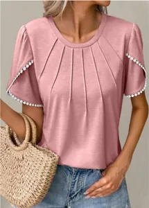 Close-up of pink round neck T-shirt featuring pleated chest and tulip sleeves with trim