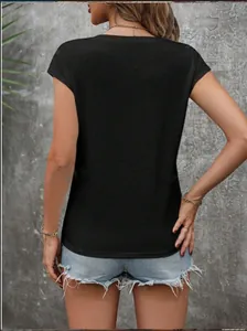 Detailed rear view of a black short-sleeved casual T-shirt worn by a female model