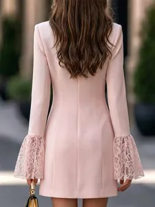 Rear view of elegant pink slim-fit dress with delicate lace flared sleeves.