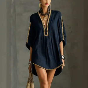 Elegant navy blue holiday mini dress with gold braided trim and V-neckline