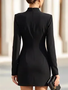 Back view of black mock neck long sleeve slim fit mini dress with metal button detail