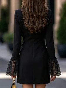 Detailed back view of a slim-fit black dress featuring elegant lace patchwork cuffs