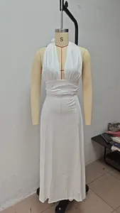 White halter neck V-neck slit maxi dress displayed on a professional dress form mannequin