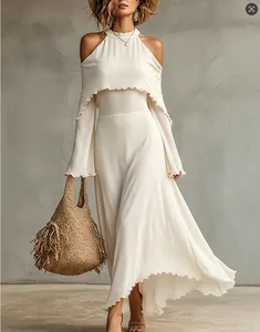 Elegant white off-the-shoulder long sleeve top with ruffled edges for summer vacation