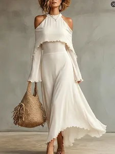 Elegant white off-shoulder long sleeve top with ruffles for summer resort style fashion