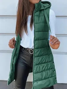 Detailed view of women's long hooded quilted puffer vest in a classic dark green