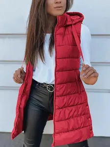 Detail view of a women's long red hooded quilted vest with zipper closure and pockets.