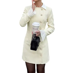 Elegant cream faux two-piece blazer dress with pleated flared cuffs and button details