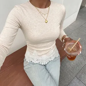 Slim fit knit long sleeve T-shirt for women with elegant white lace hem detail.