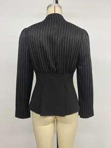Detailed back view of a sophisticated pinstriped patchwork long-sleeved waist blouse