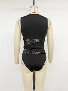 Back view of black sleeveless bodysuit with lace hollow-out and twist detail on mannequin